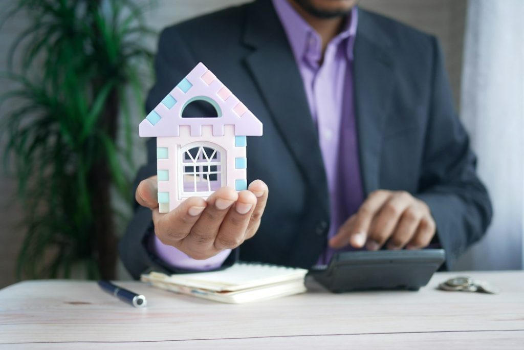 House model representing real estate investment